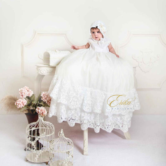luxury white baby baptism dress with lace layers ruffles and rich detailed embellishments