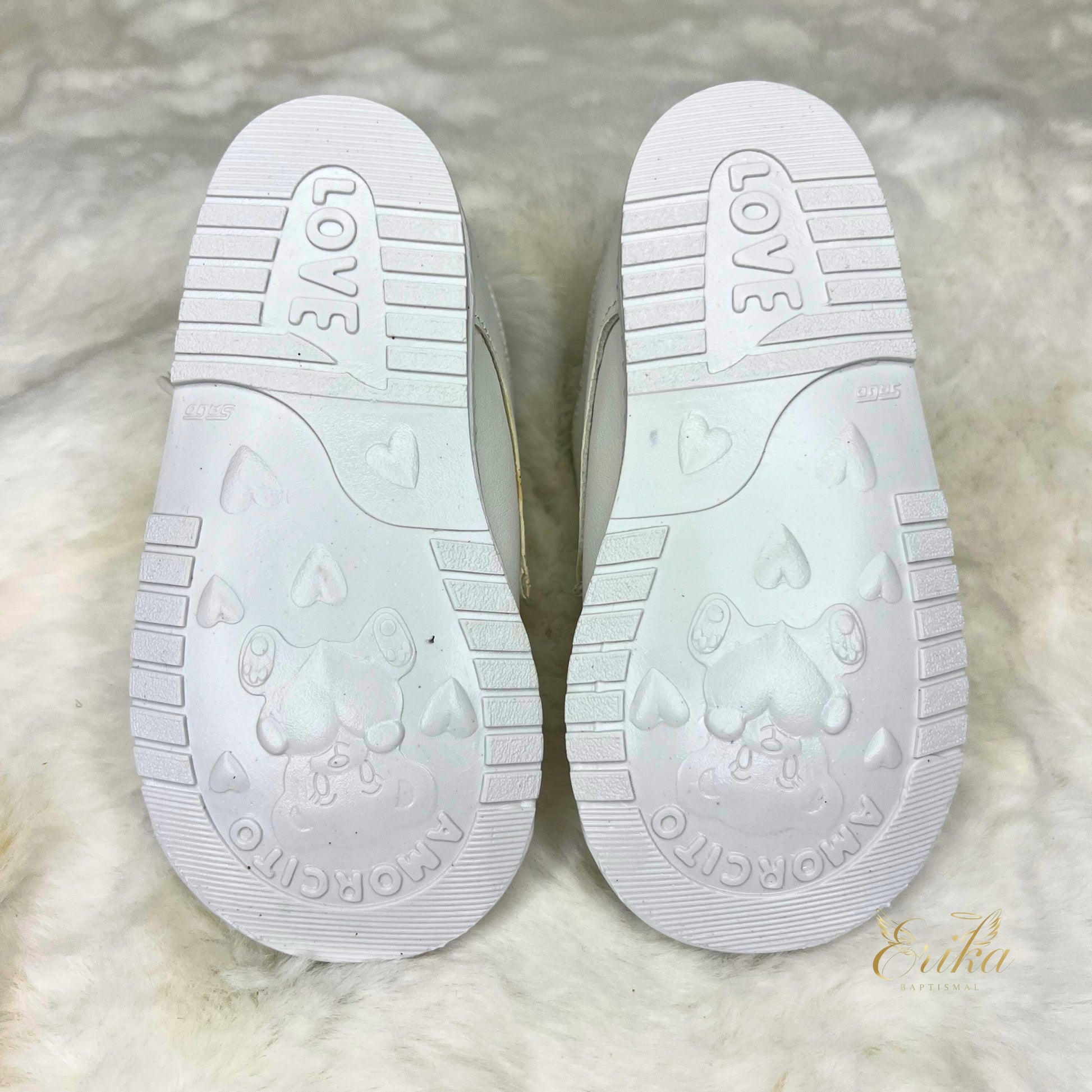 cute white baby boy christening shoes with delicate details and soft fabric