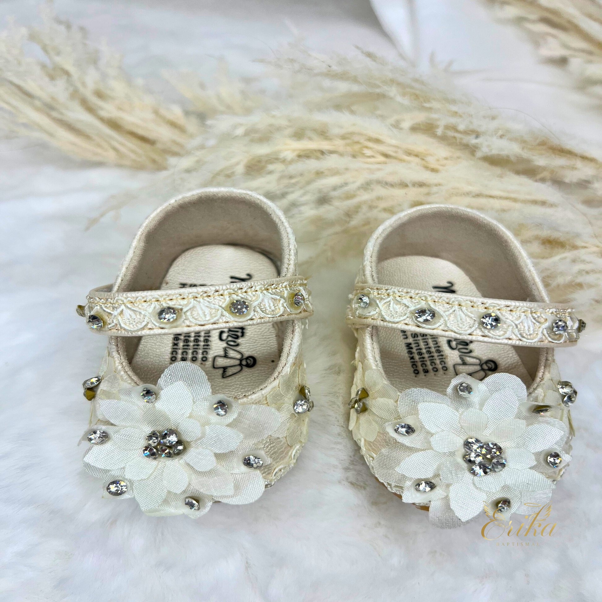white baby girl christening shoes with 3D floral appliques and soft soles by Erika Baptismal