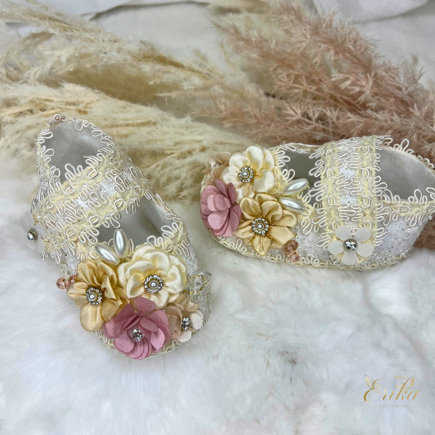 baby christening shoes with floral details and soft comfortable fabric