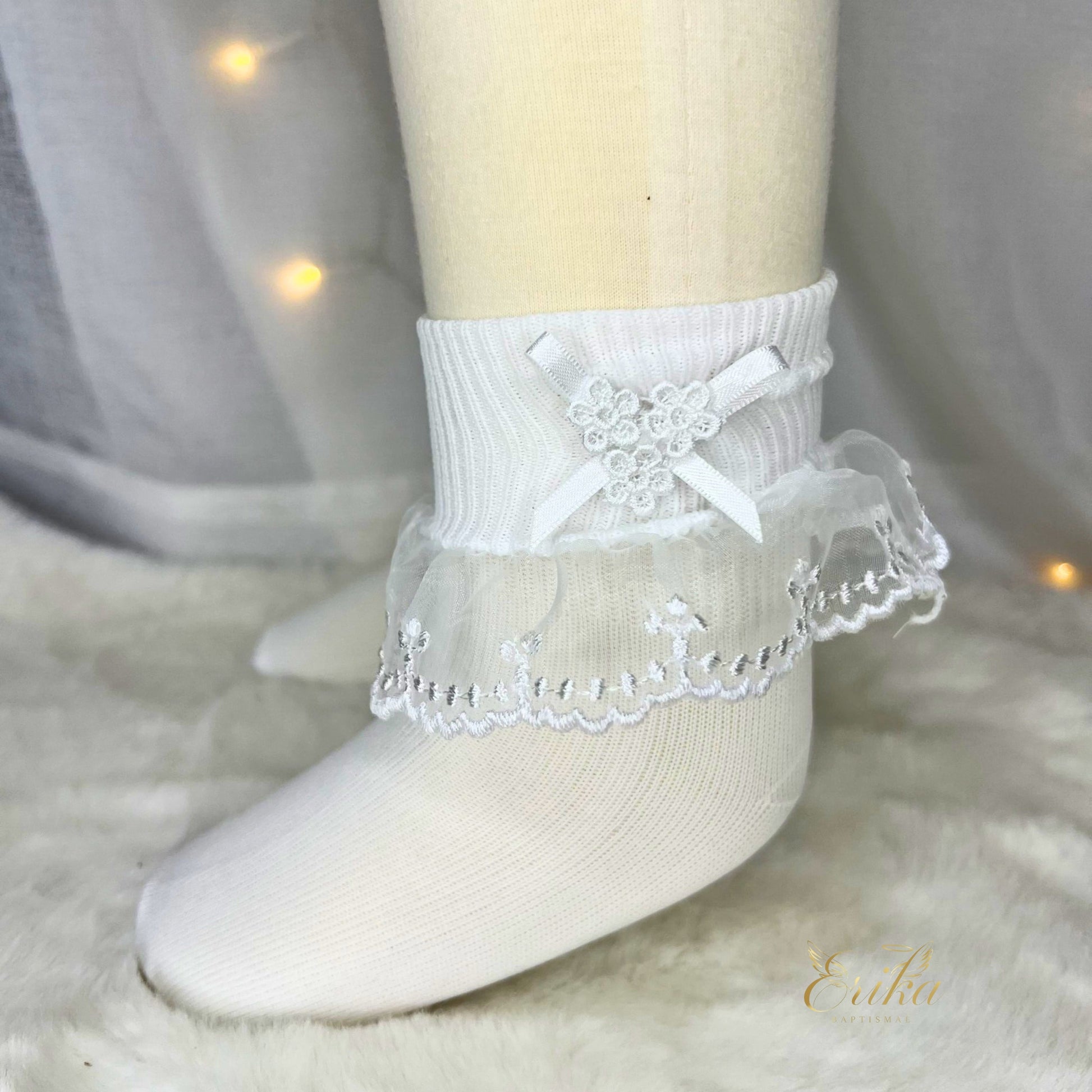 white baby christening socks with lace ruffle details and soft breathable fabric