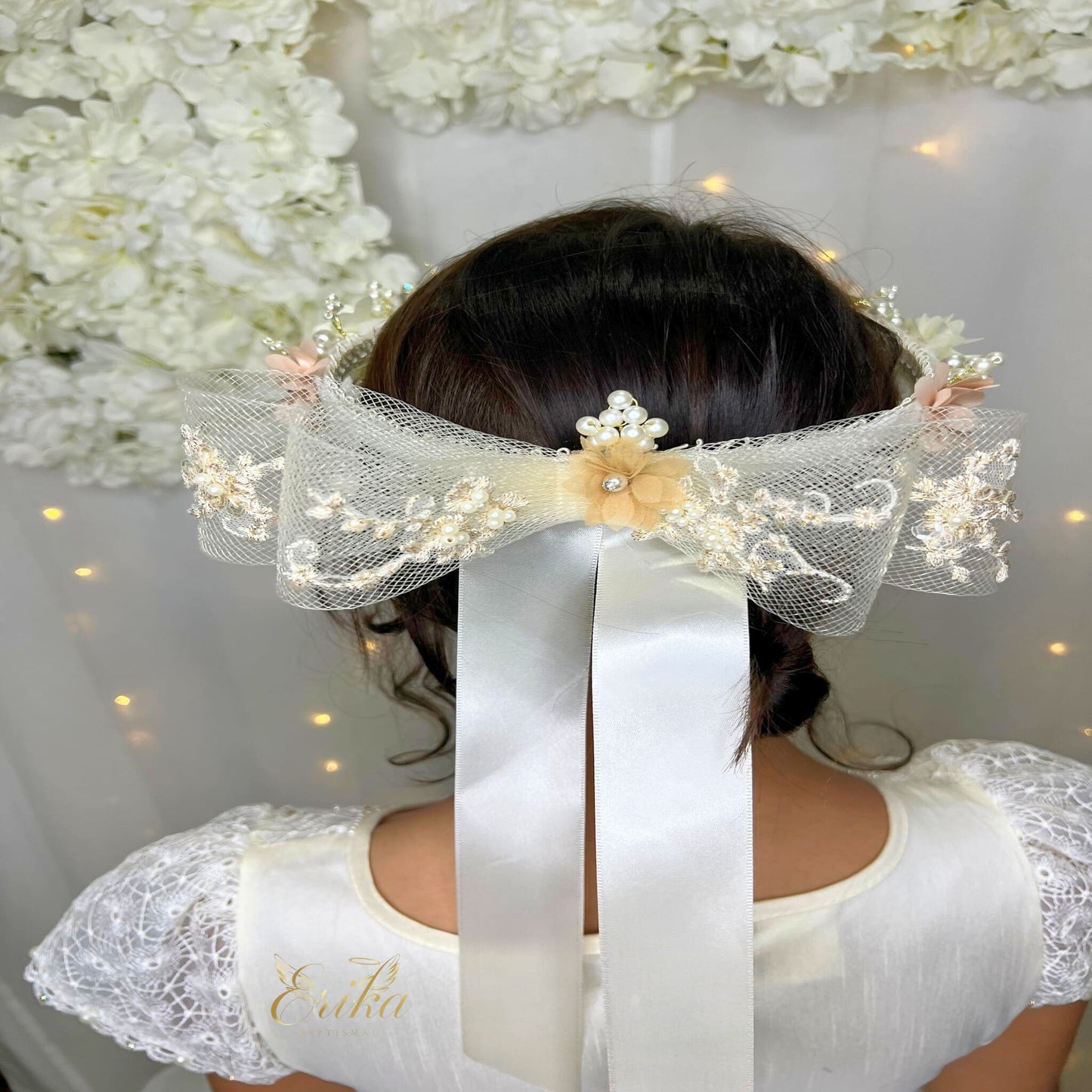 elegant baby floral crown headband by Erika Baptismal with delicate floral accents and soft band