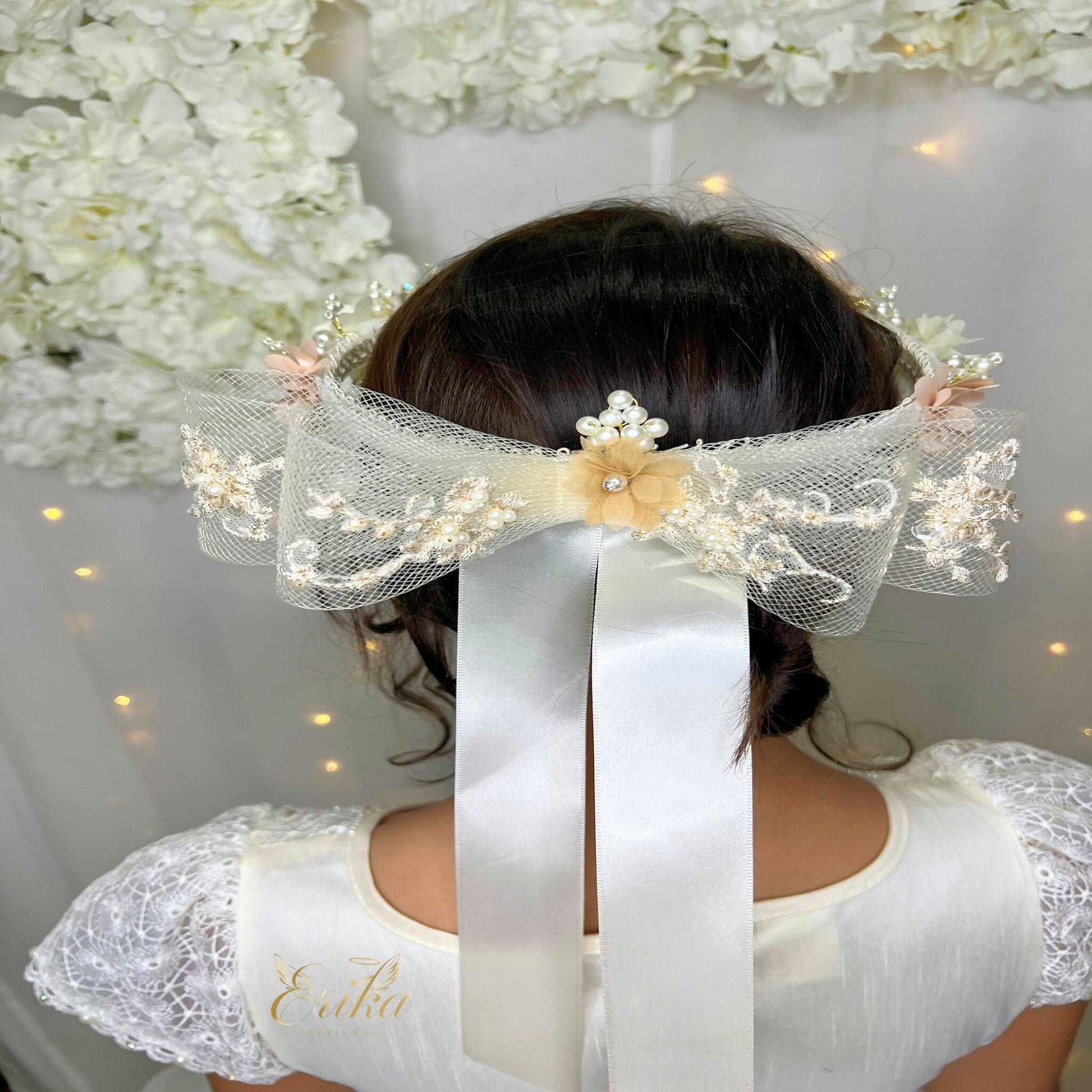 elegant baby floral crown headband by Erika Baptismal with delicate floral accents and soft band