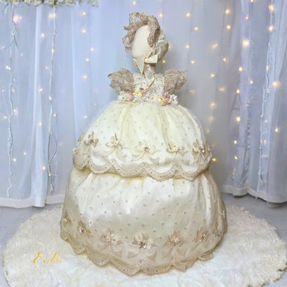 budget pearl color baby christening dress with ruffles and floral embroidered details in soft fabric