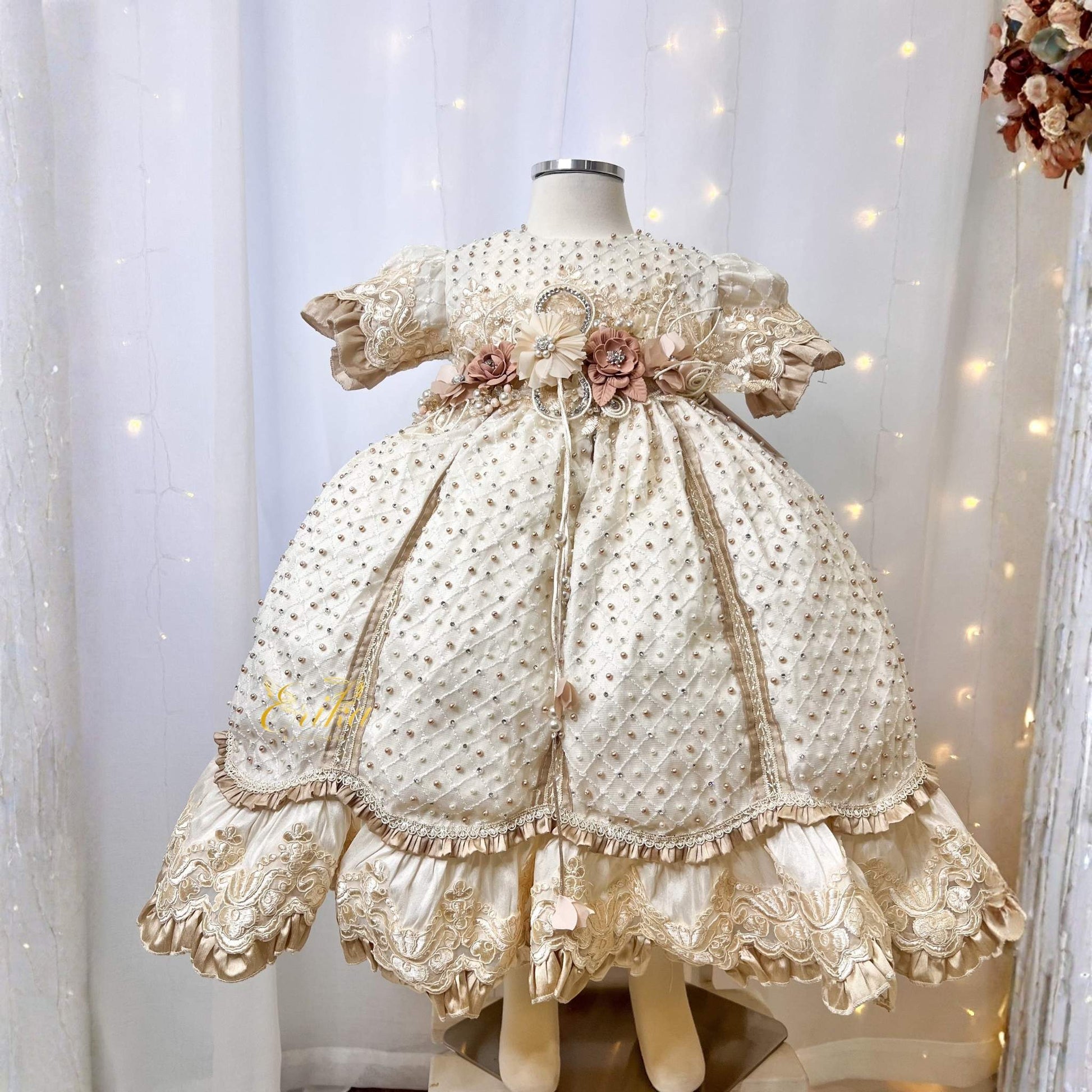 budget short baby christening dress with vintage style gold accents and floral embroidery in soft fabric