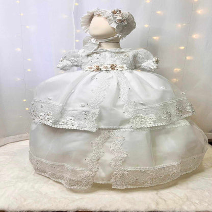 inexpensive white baby christening dress with floral details and soft lightweight fabric