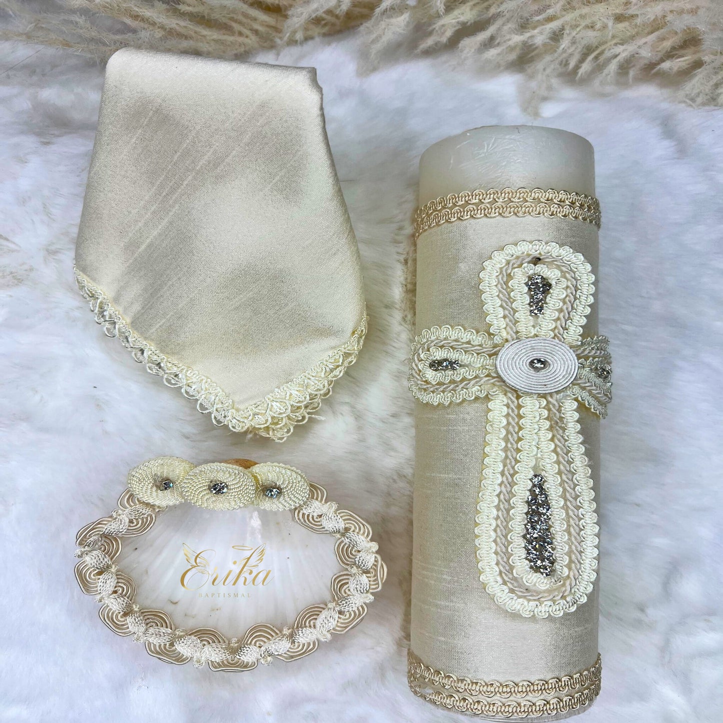 Minimalist boy's white baptismal set with discrete pearl borders on the candle
