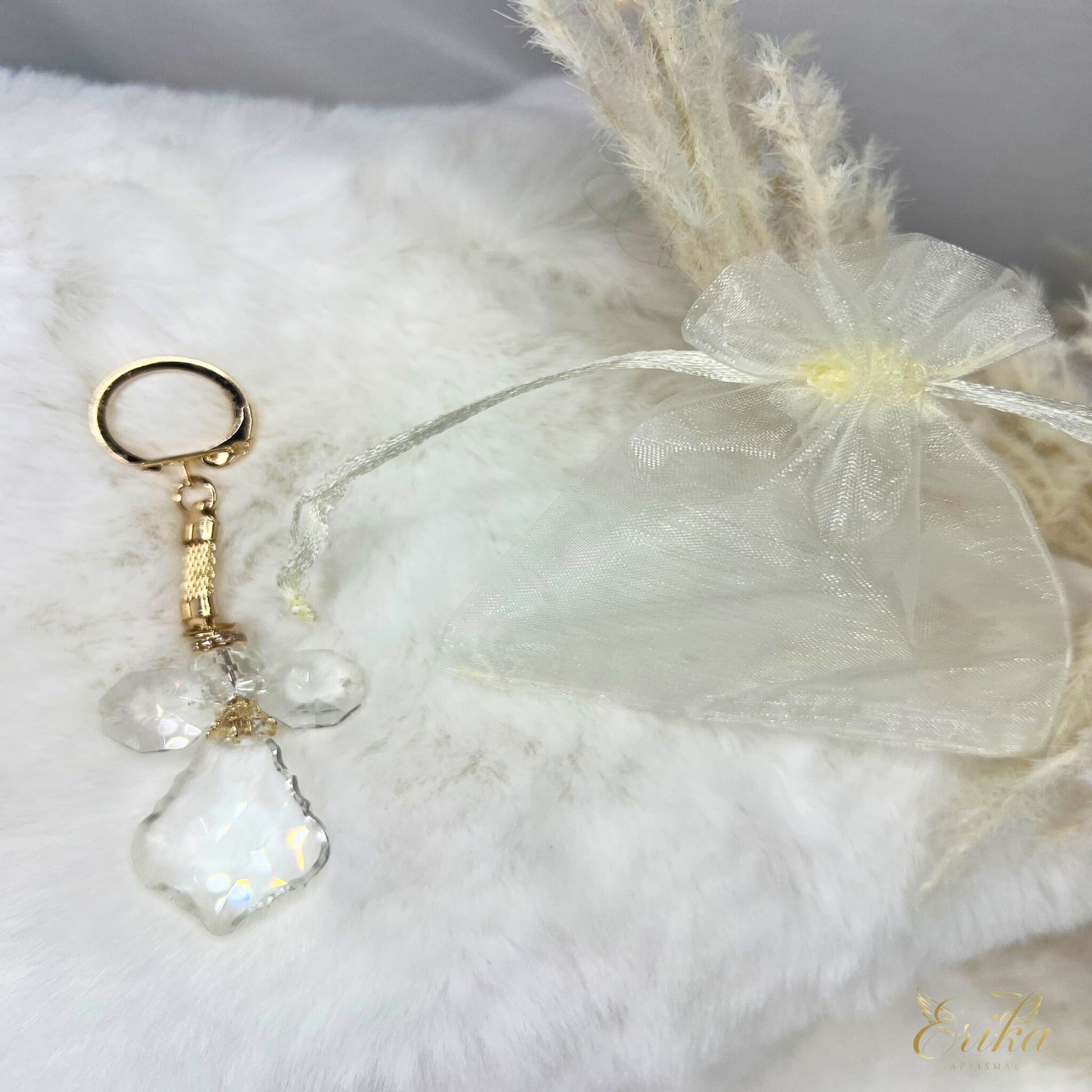 Handcrafted baptismal angel keychain in a tulle bag by Erika Baptismal