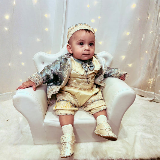 baby boy christening outfit in blue and pearl tones with lace details and elegant soft fabric