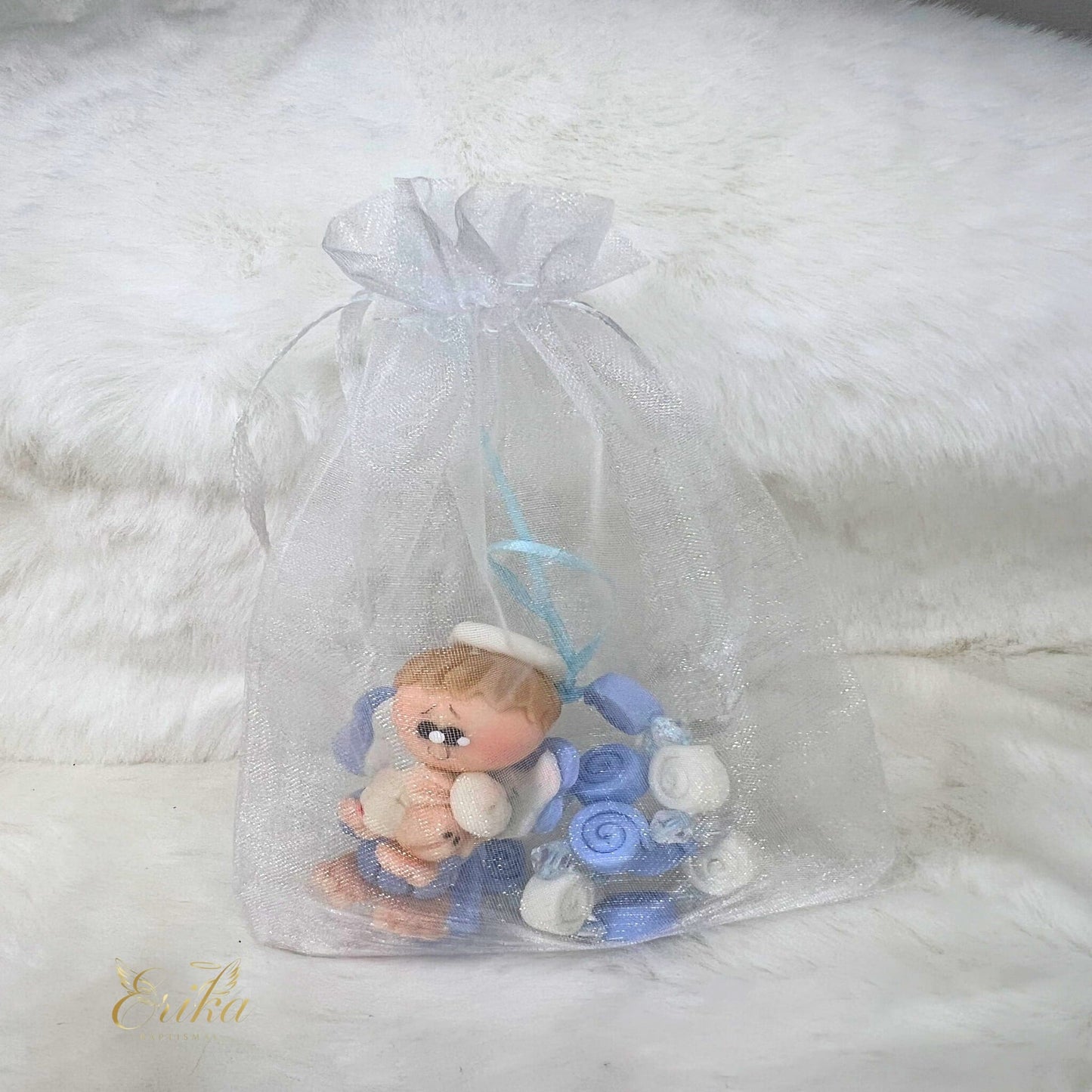 Handcrafted cold porcelain angel keepsake for boy's baptism by Erika Baptismal