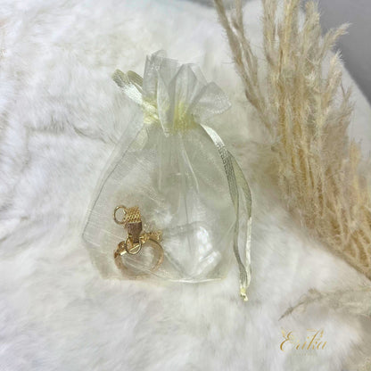 Guardian angel keychain in a tulle bag for christening guests by Erika Baptismal