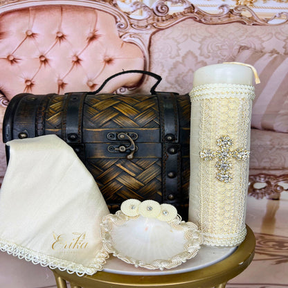 Boy's ceremonial kit including a rhinestone-accented candle, baptismal shell, and hanky
