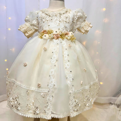 traditional baby baptism outfit in white with embroidered details and soft fabric