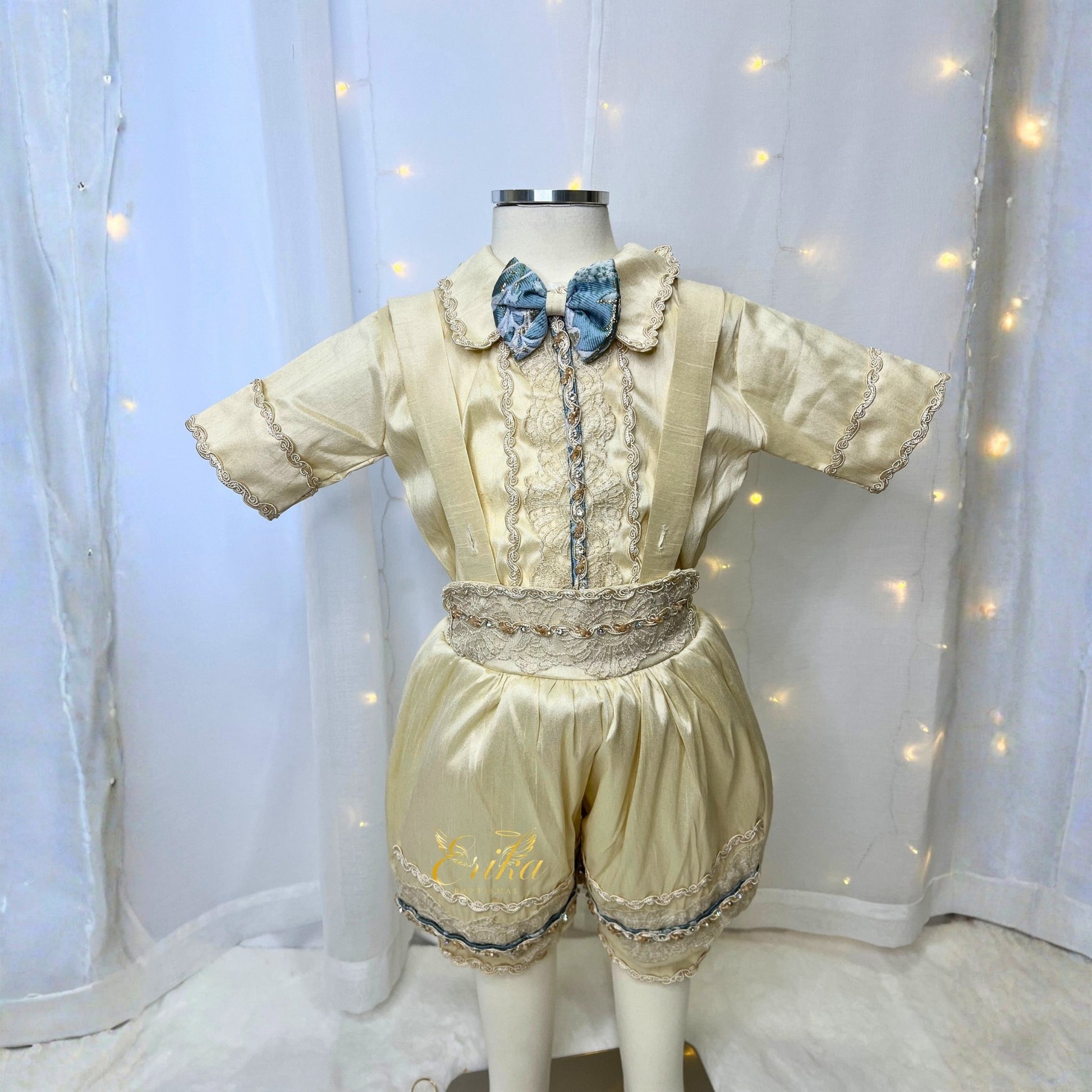 classic baby boy baptism outfit in blue and pearl with lace trim and soft elegant design