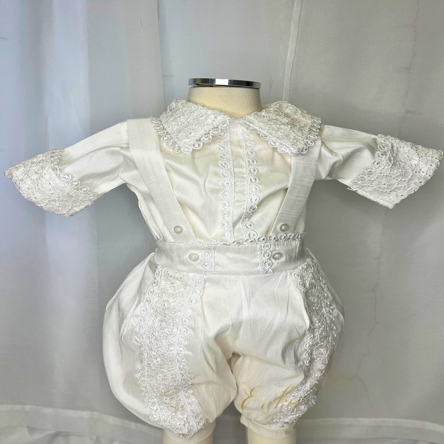 classic baby boy christening set with vest shirt and shorts in soft elegant fabric with matching bonnet