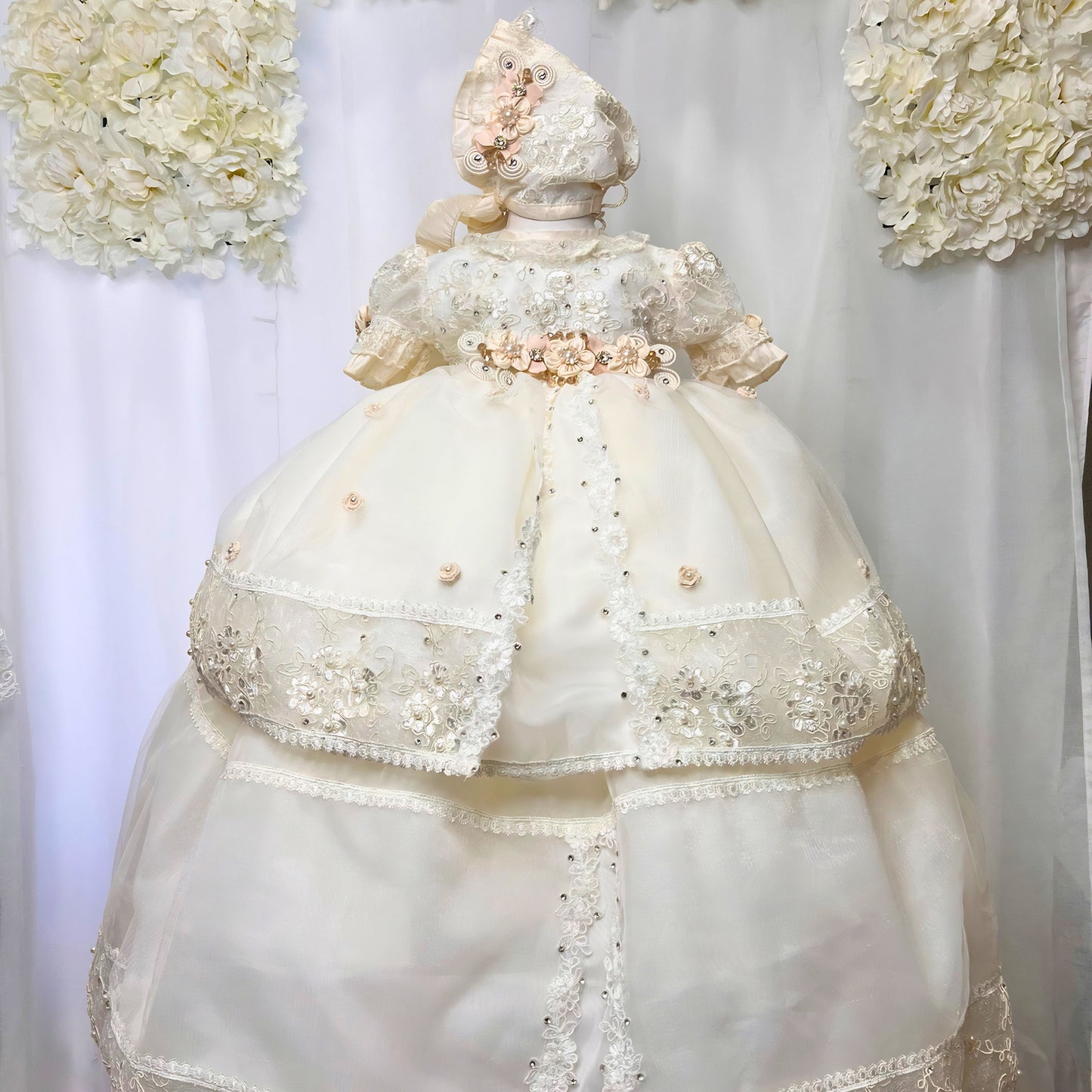 Luxury christening gown for baby with lace embroidery and delicate fabric