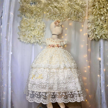 elegant long baby baptism dress with lace ruffles and floral waist accent in delicate soft fabric