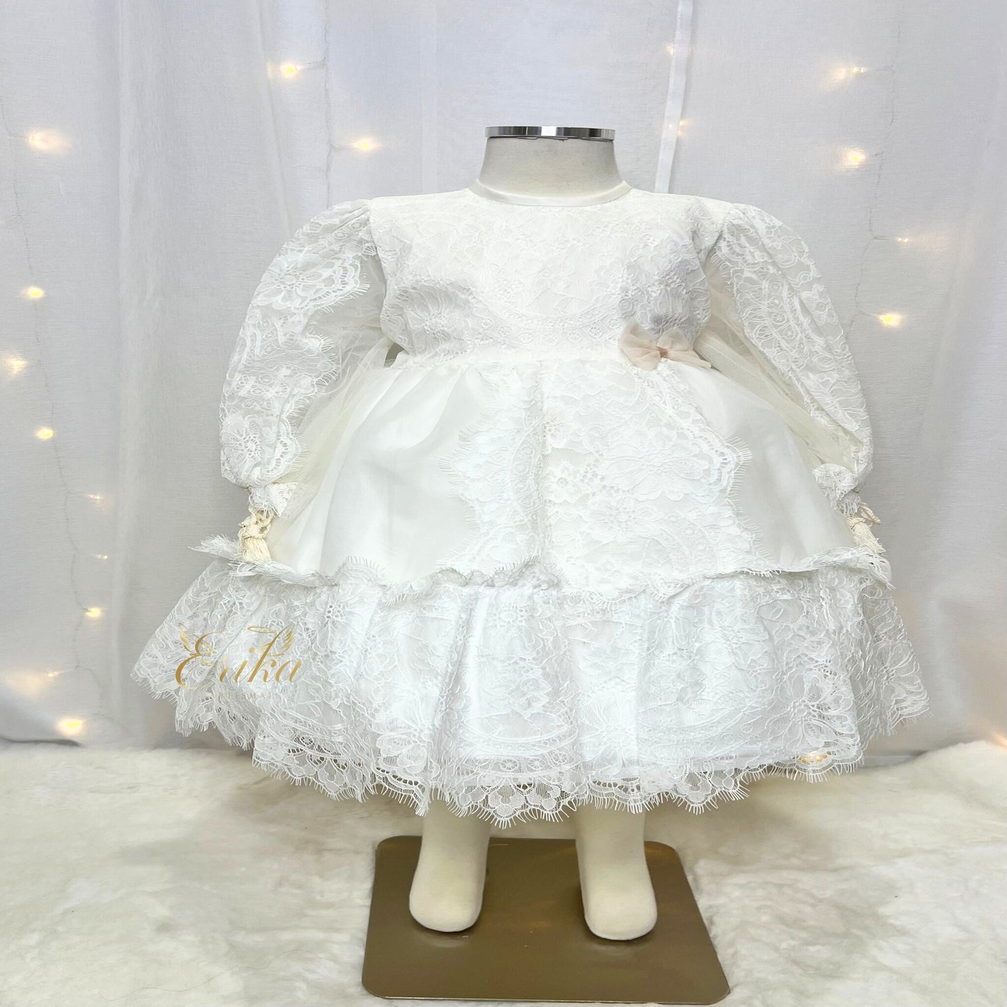 elegant long baby christening gown inspired by Spanish design with delicate finishes and soft fabric