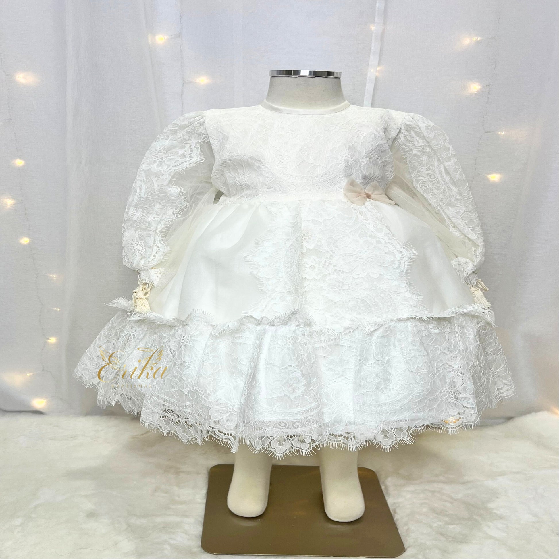 elegant long baby christening gown inspired by Spanish design with delicate finishes and soft fabric