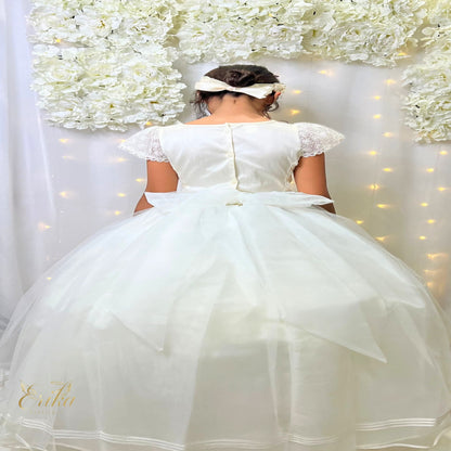 Front view of the pearl Mariposa model First Communion dress with 3D butterflies.