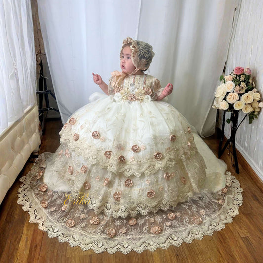 baby christening dress with embedded floral details and delicate lace in soft elegant fabric