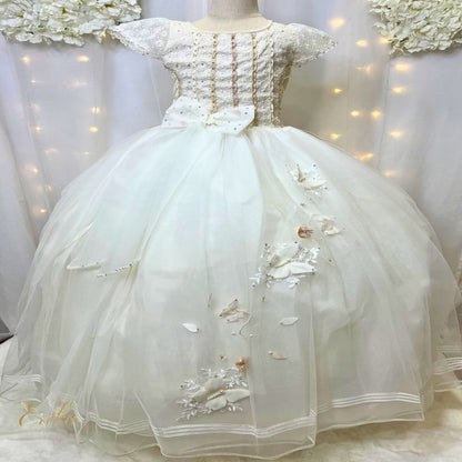 Gold-threaded embroidery and 3D butterflies on a pearl Communion dress