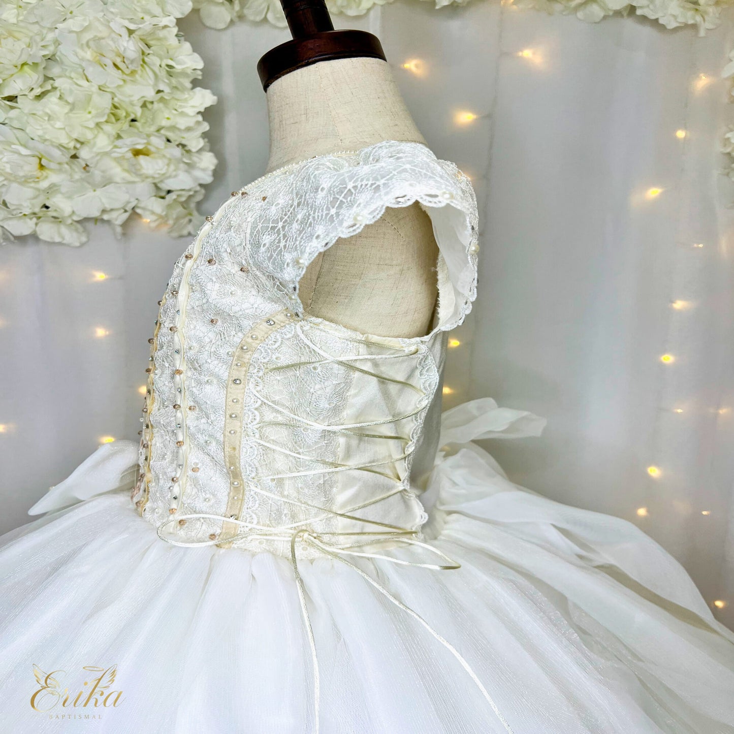 Exquisite hand-beaded First Communion gown with a butterfly theme and golden accents