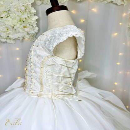 Exquisite hand-beaded First Communion gown with a butterfly theme and golden accents