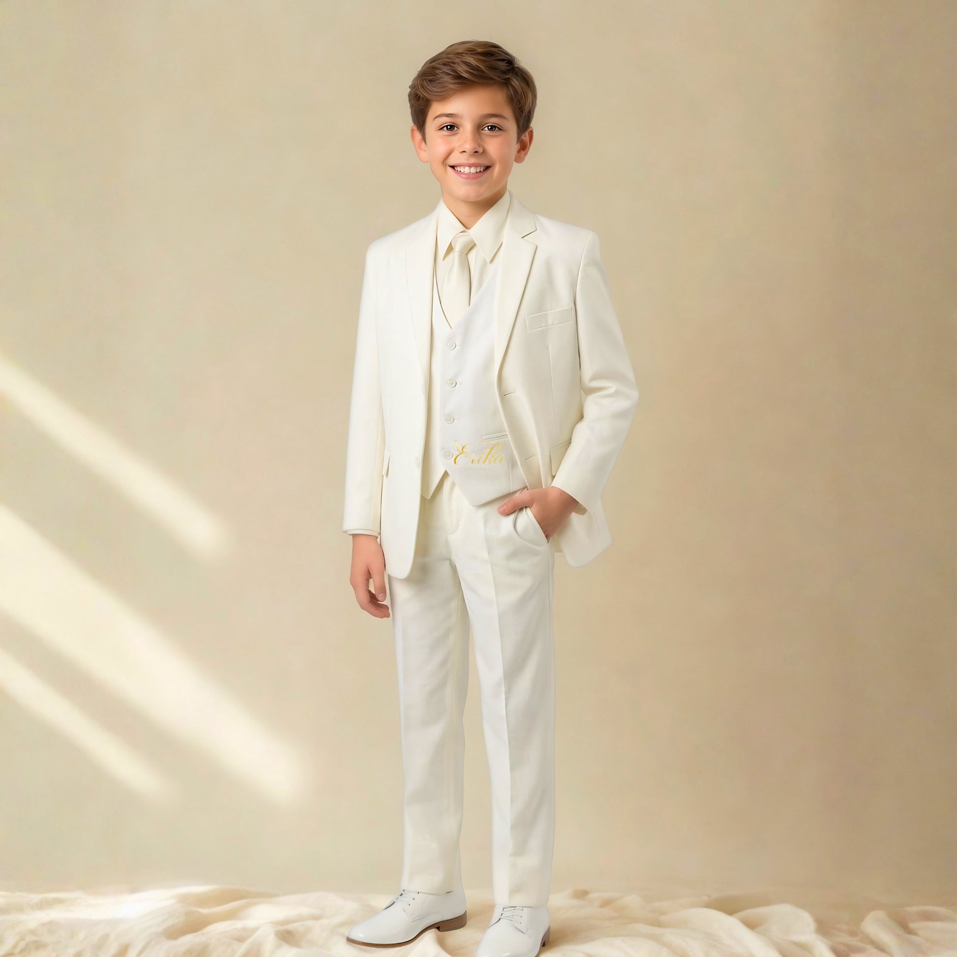 ice white boys first communion suit by Erika Baptismal with elegant tailored design and soft premium fabric