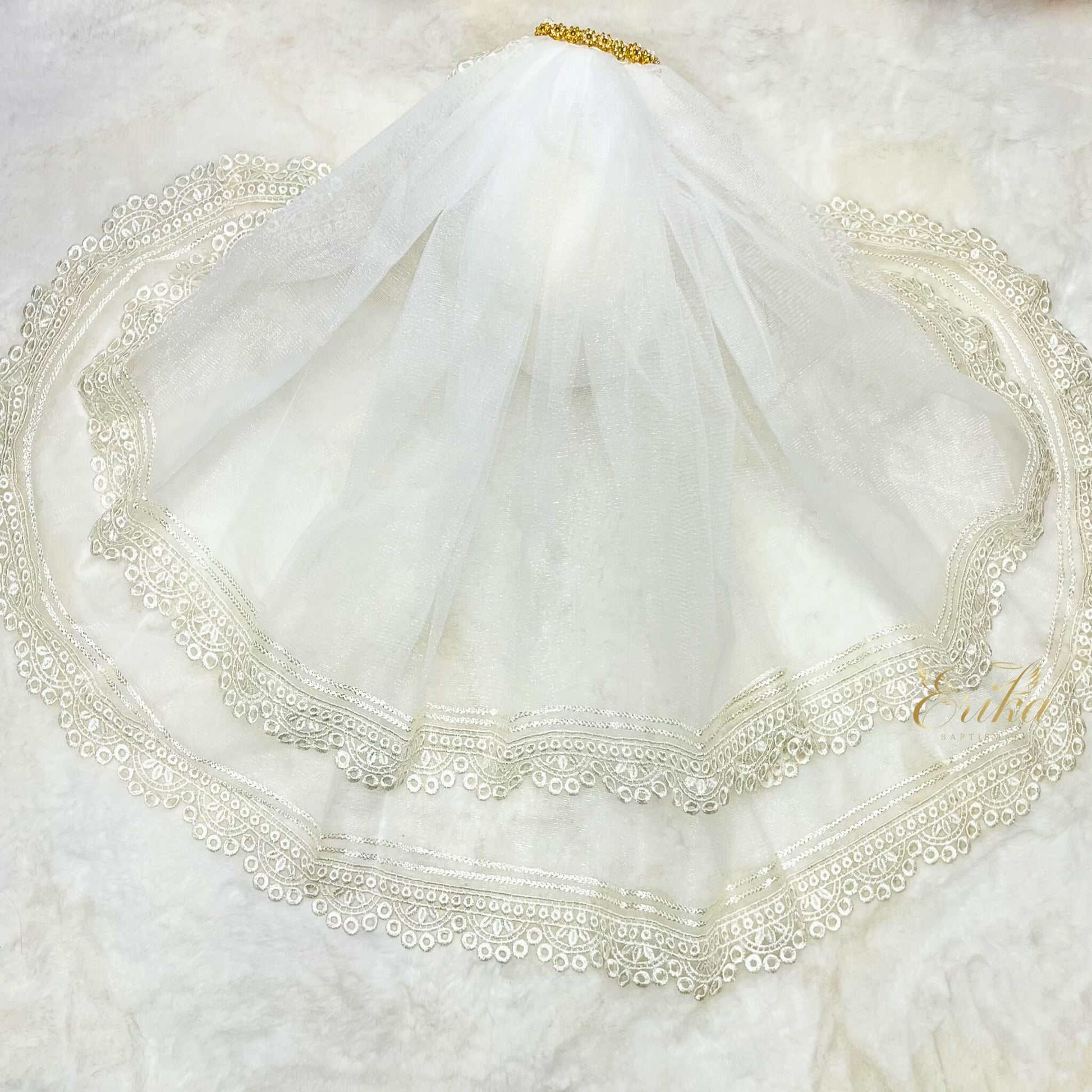First Communion veil featuring an intricate and heavy double lace design