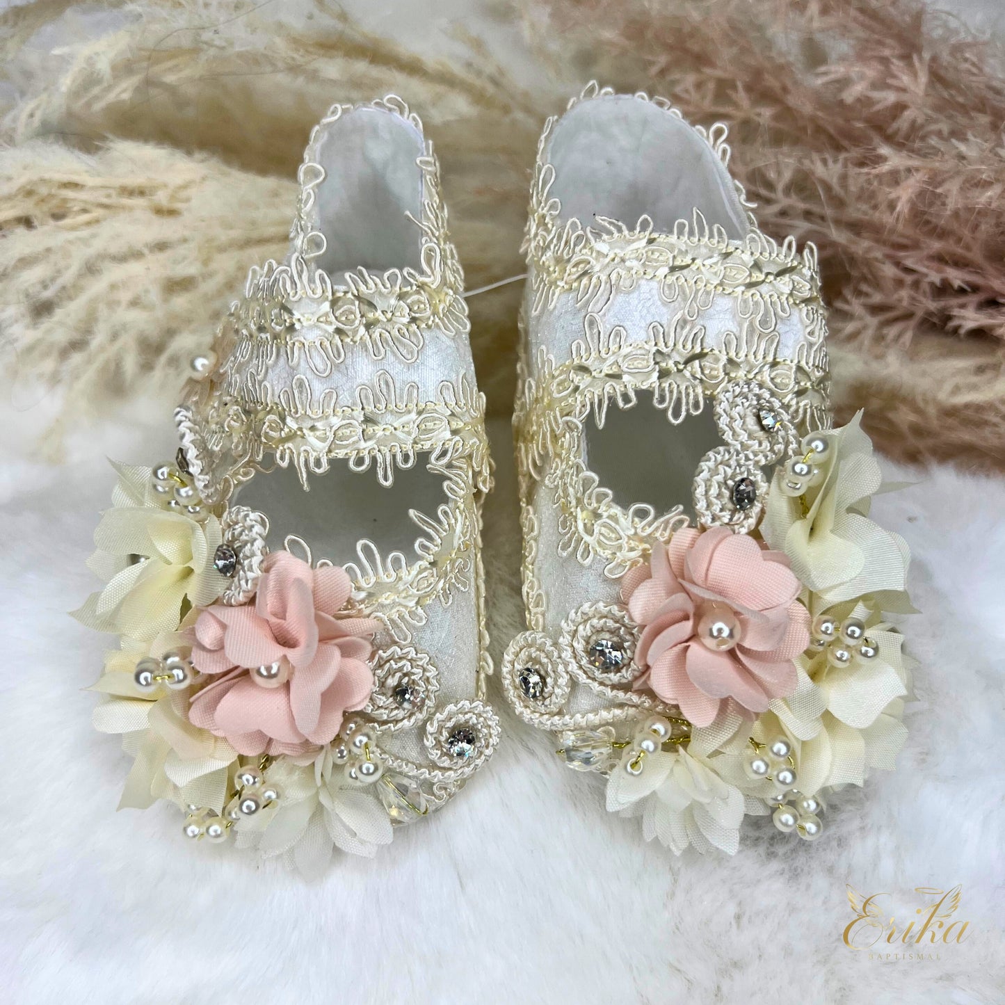White lace baptismal shoes for girls with central flower appliqué