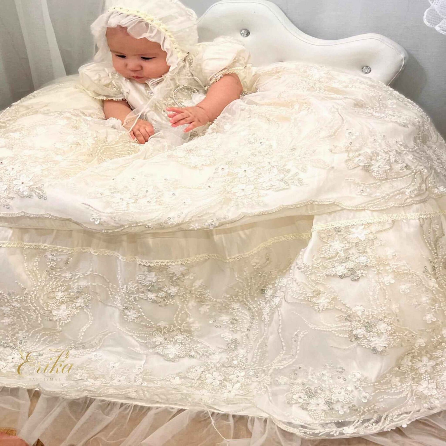 affordable white baby christening dress with floral embroidered accents and soft delicate fabric