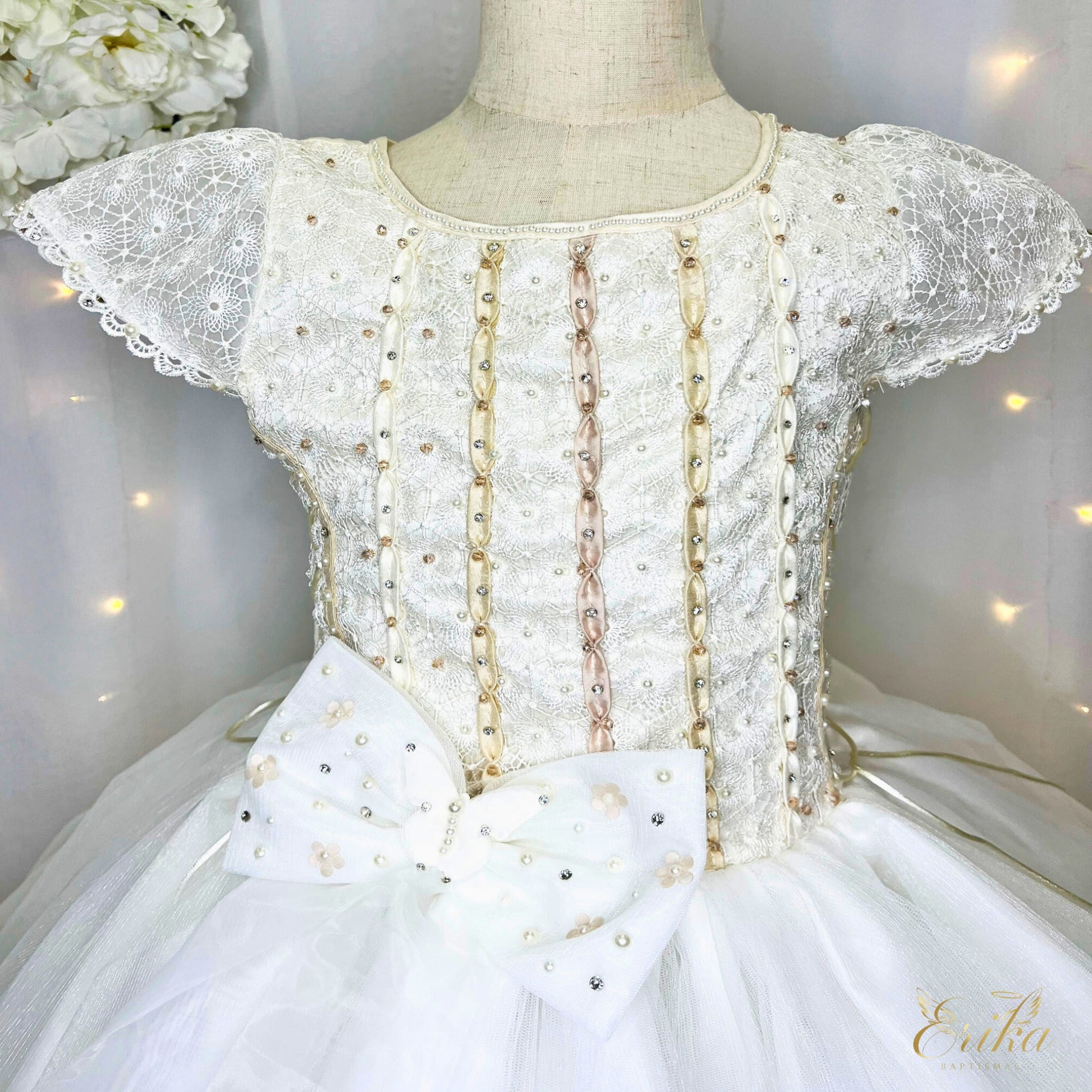 Close-up of the luxury hand-beaded bodice on the Mariposa First Communion dress