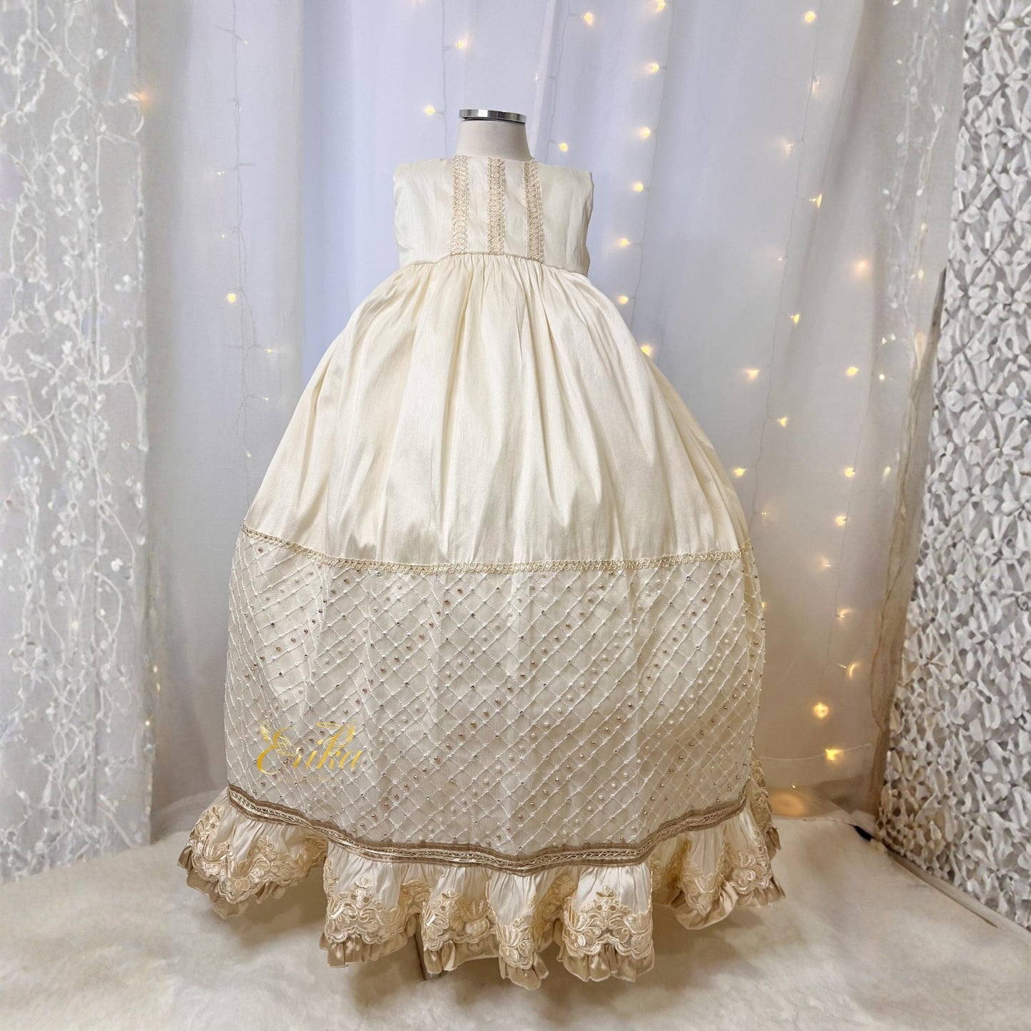 luxury long baby christening gown with vintage style gold accents floral embroidery and premium soft fabric