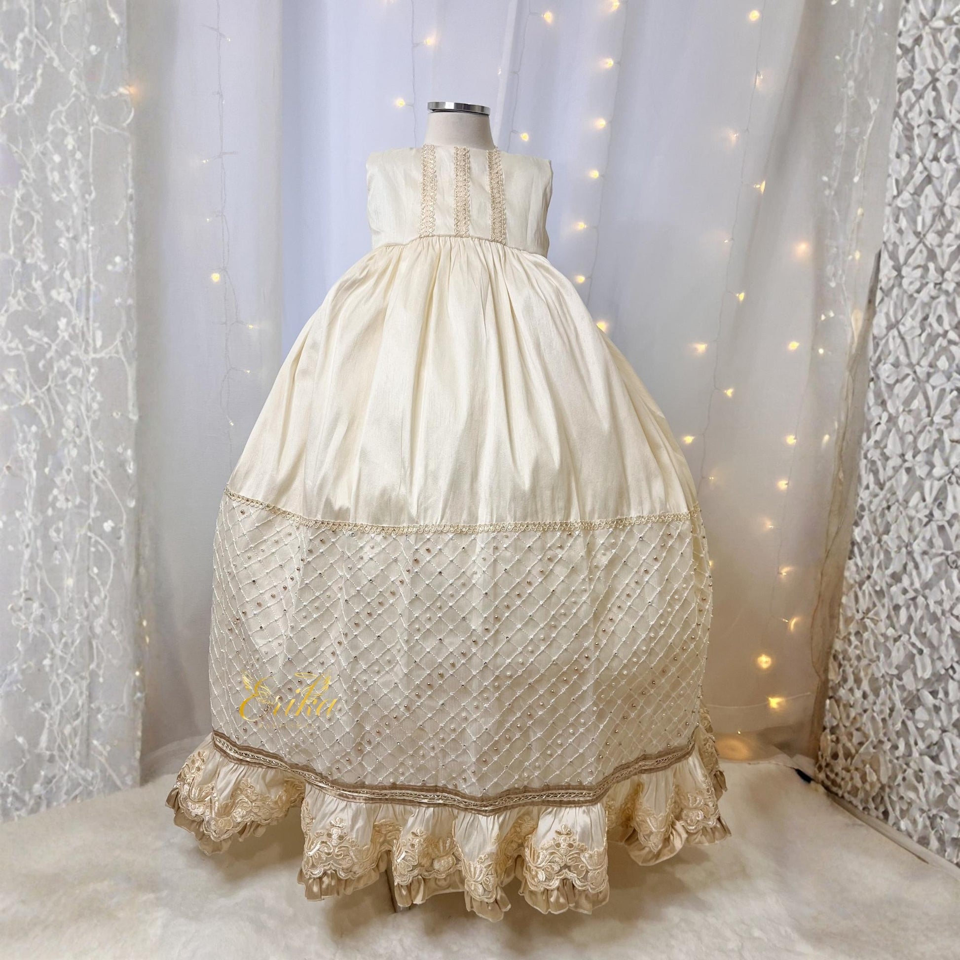 luxury long baby christening gown with vintage style gold accents floral embroidery and premium soft fabric