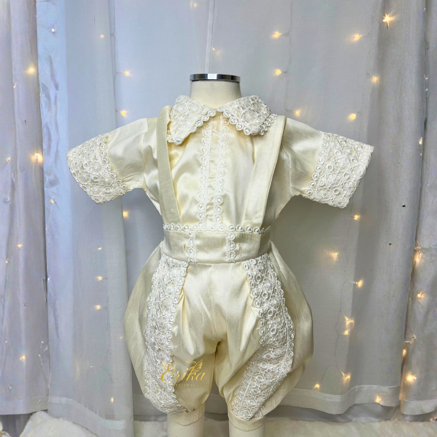 modern baby boy christening outfit with three piece set including vest shirt shorts and matching bonnet in soft fabric