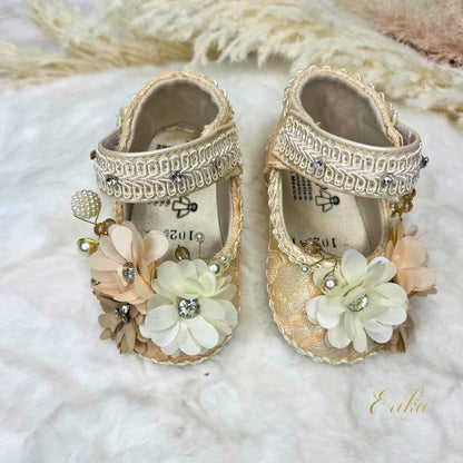 Pearl christening shoes for baby girls with 3D floral appliqués and soft soles.