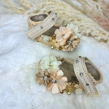 Pearl christening shoes for baby girls with 3D floral appliqués and soft soles.