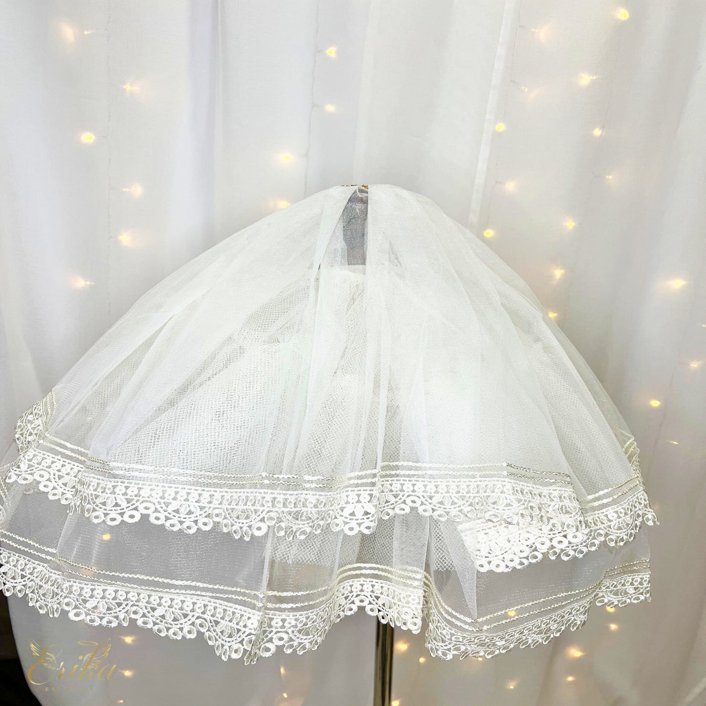 First Communion veil featuring an intricate and heavy double lace design