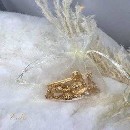 Hand-assembled crystal and gold mystery for baptismal guest favors by Erika Baptismal