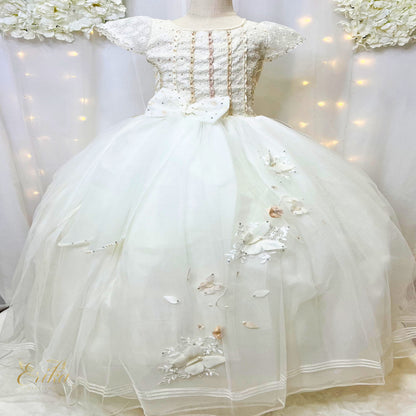 Detailed side view of the Sacred First Communion butterfly dress with lace-up corset.