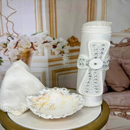 Bright white baptismal set for boys with shimmering pearl details and satin