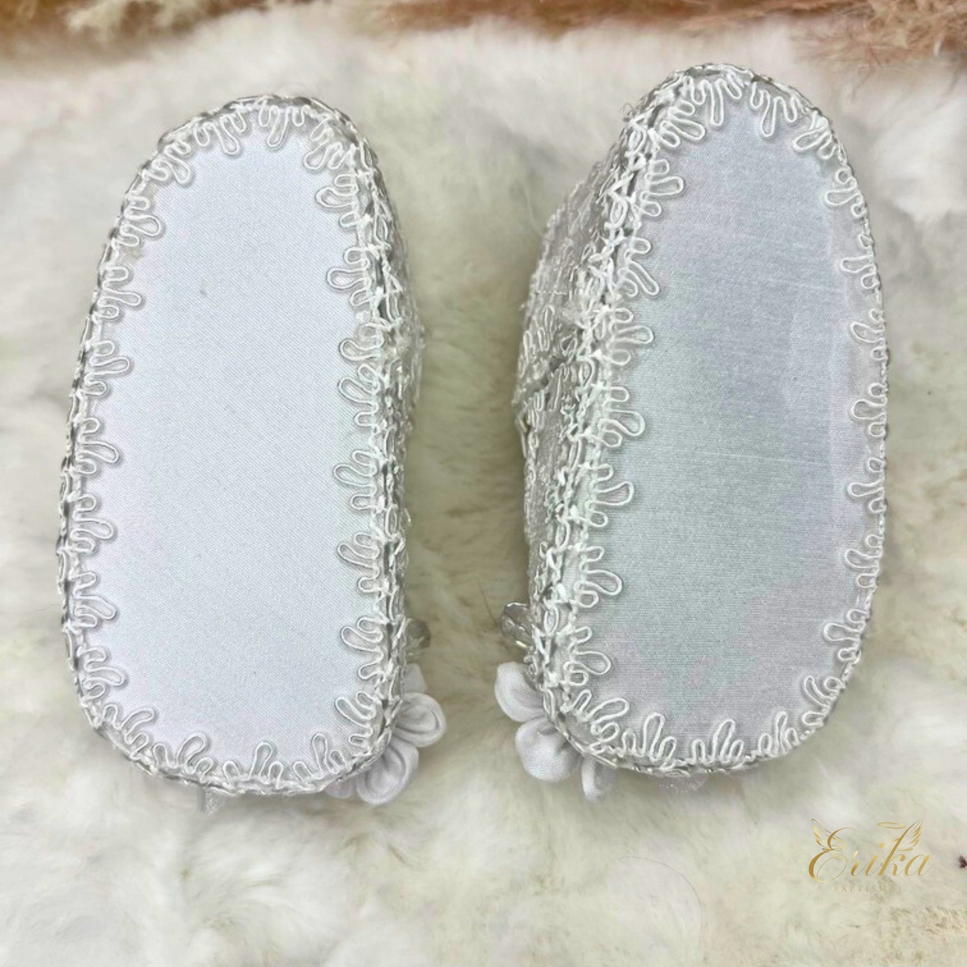 Soft-soled baby girl baptism shoes with delicate petal overlays