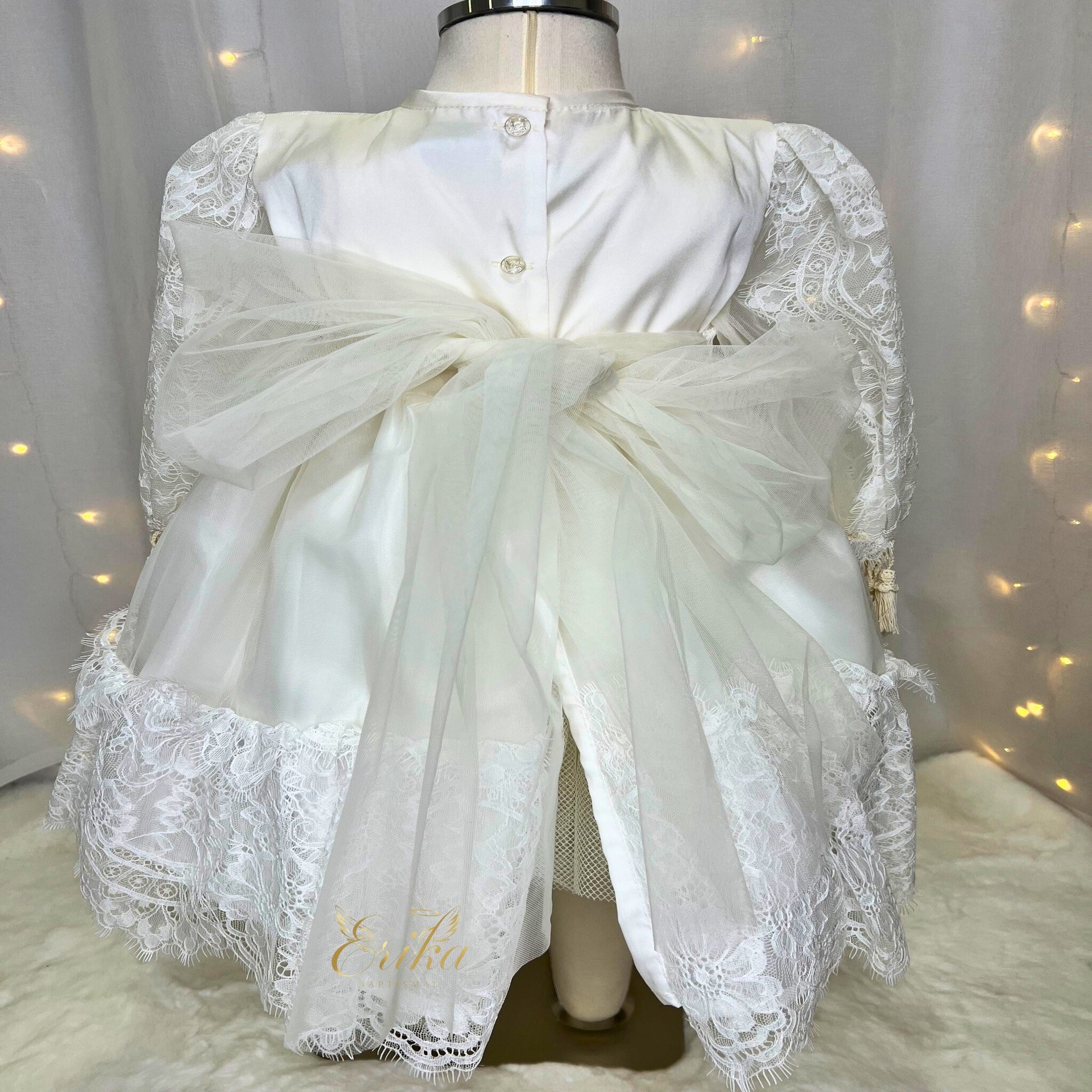 long baby baptism dress inspired by Spanish style with classic silhouette and refined details