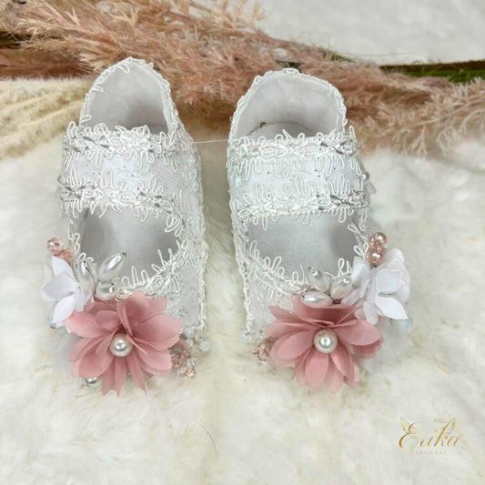 Soft-soled baby girl baptism shoes with delicate petal overlays